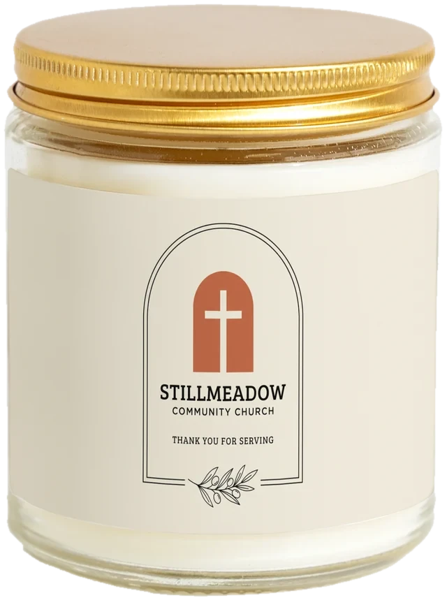 A 9 oz candle jar with a sample Church & ministry volunteer gifts label