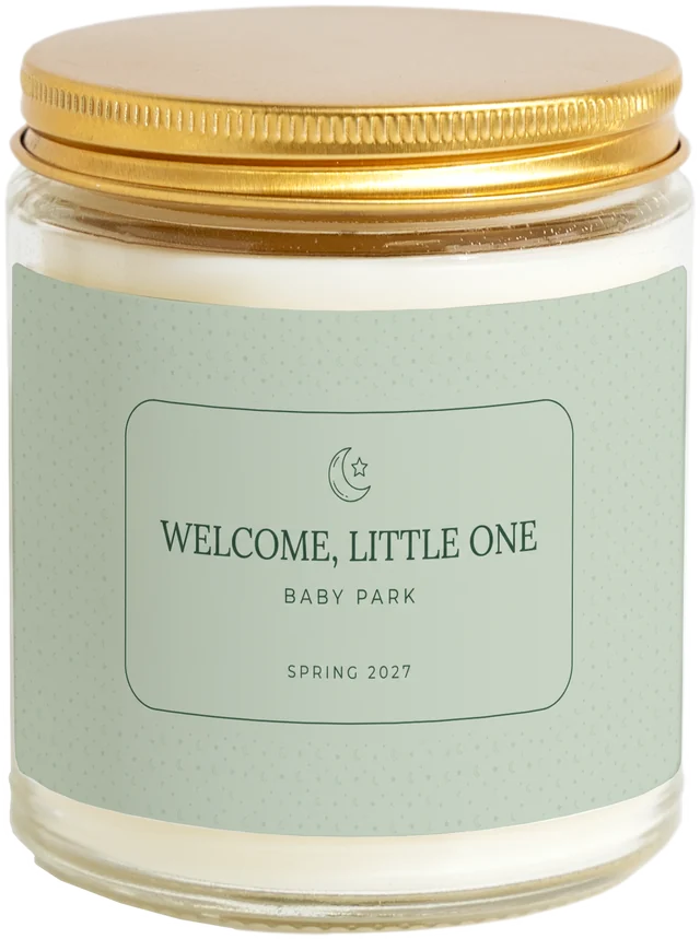 A 9 oz candle jar with a sample Baby shower favors label