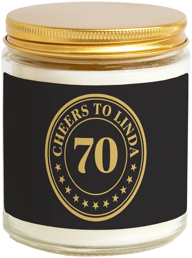 A 9 oz candle jar with a sample Milestone birthday favors label