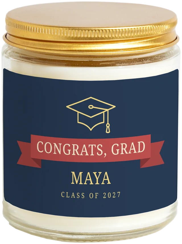 A 9 oz candle jar with a sample Graduation party favors label