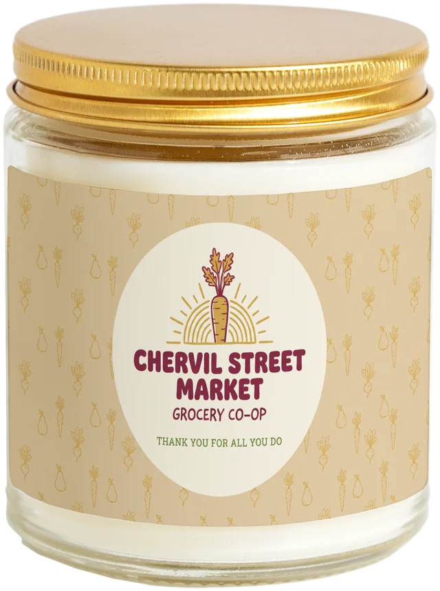 A 9 oz candle jar with a sample Administrative Professionals Day gifts label