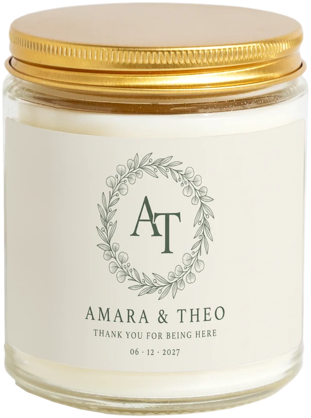 A 9 oz candle jar with a sample Wedding welcome bag gifts label