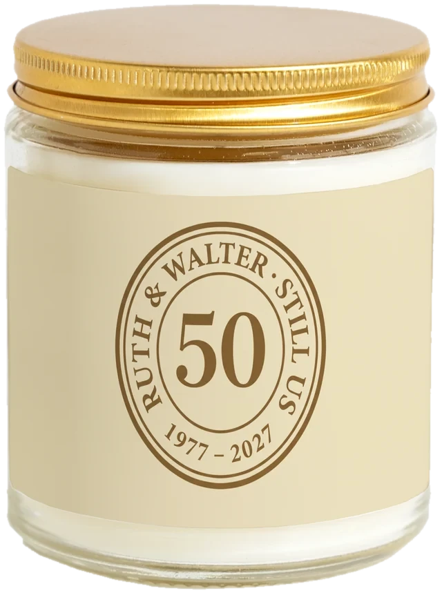 A 9 oz candle jar with a sample Vow renewal favors label