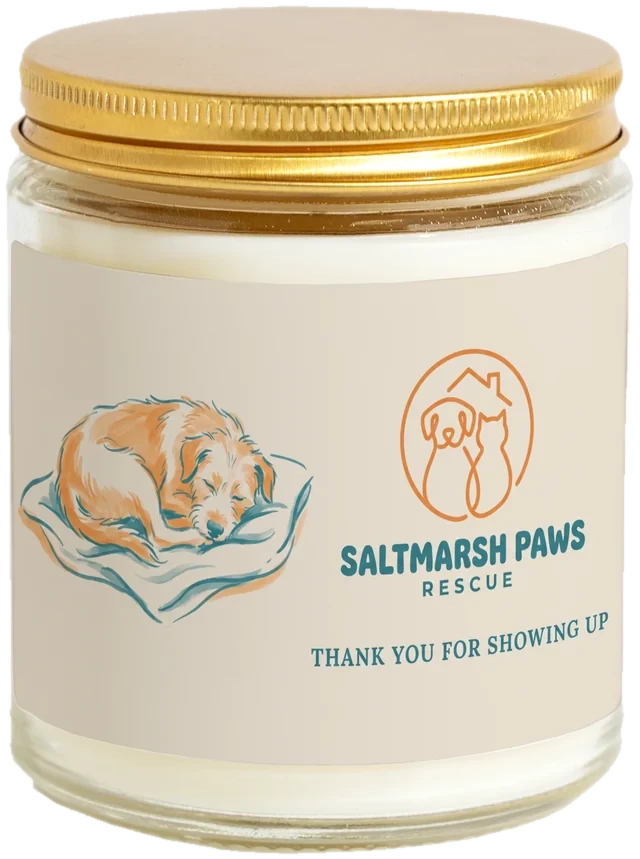 A 9 oz candle jar with a sample Volunteer appreciation gifts label