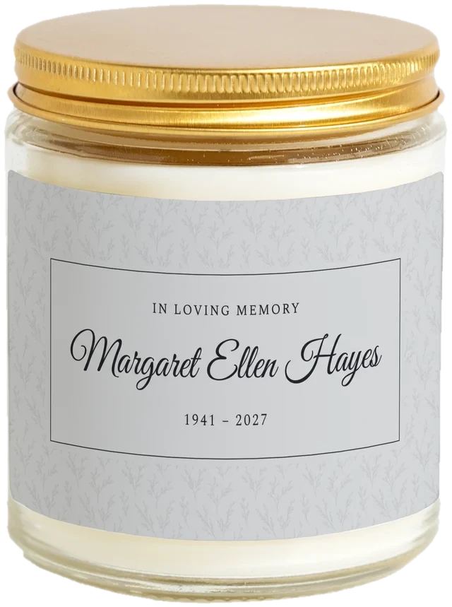 A 9 oz candle jar with a sample Celebration of life favors label