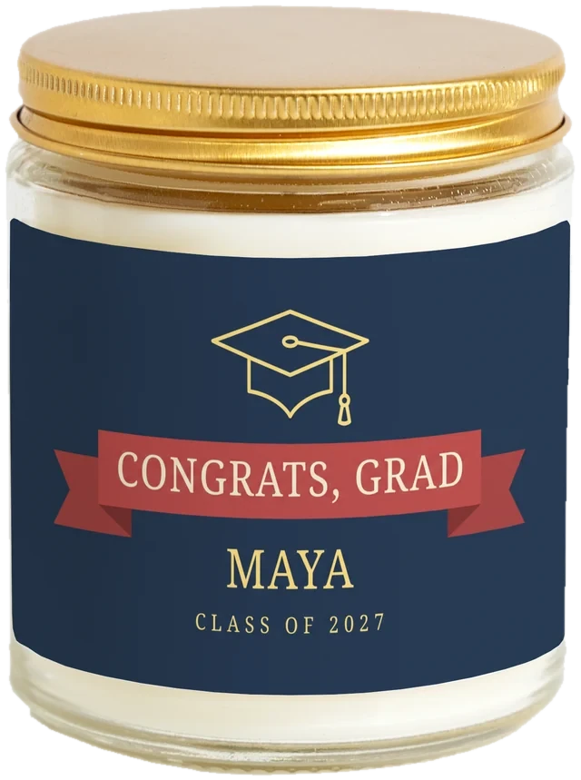 A 9 oz candle jar with a sample Graduation party favors label