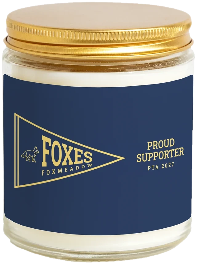 A 9 oz candle jar with a sample PTA fundraiser gifts label