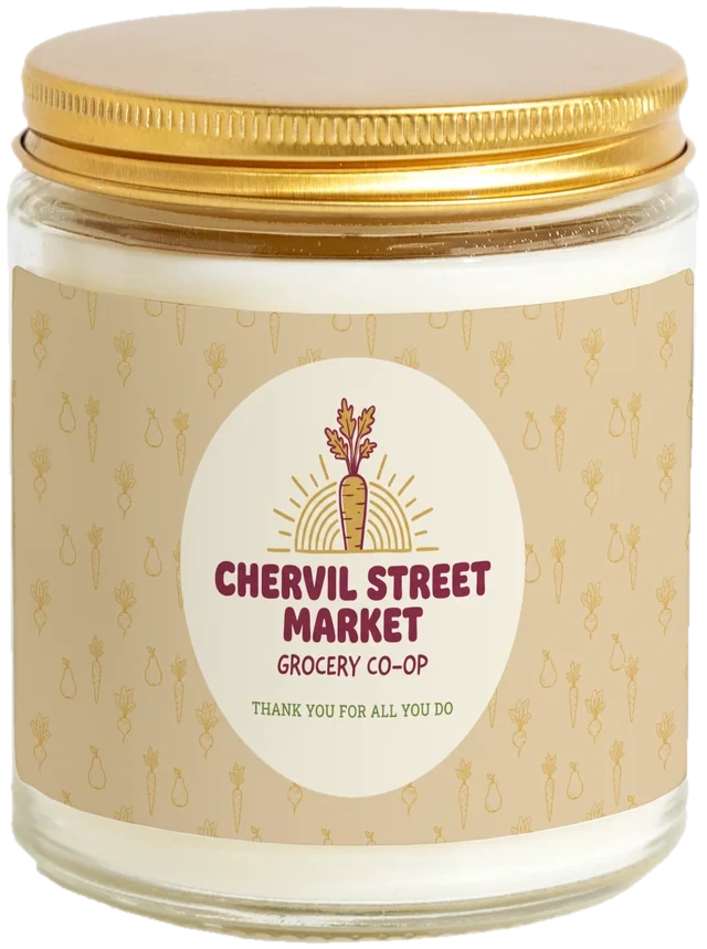A 9 oz candle jar with a sample Administrative Professionals Day gifts label