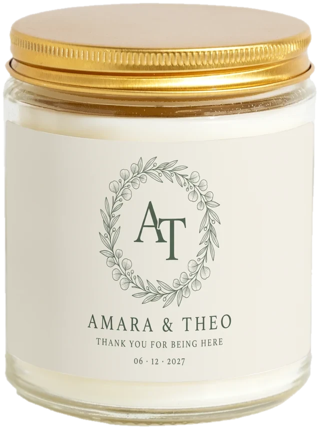 A 9 oz candle jar with a sample Destination wedding welcome favors label
